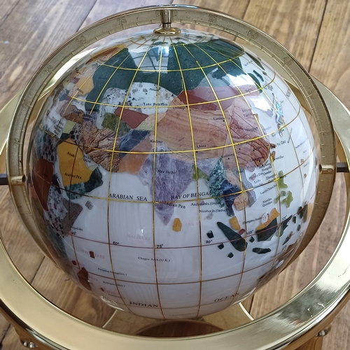 35 - This really is a lovely piece a Mother of Pearl and Gem Stone World Globe with a Compass set in the ... 