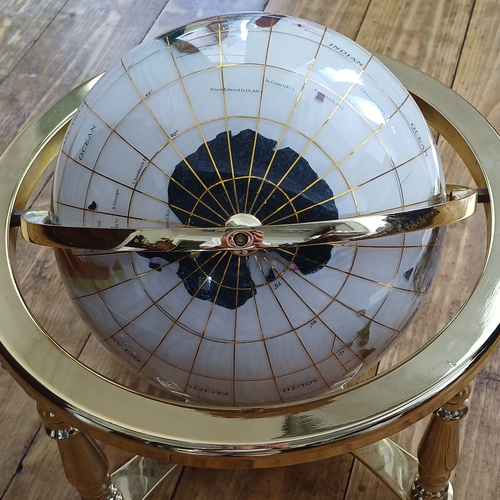 35 - This really is a lovely piece a Mother of Pearl and Gem Stone World Globe with a Compass set in the ... 