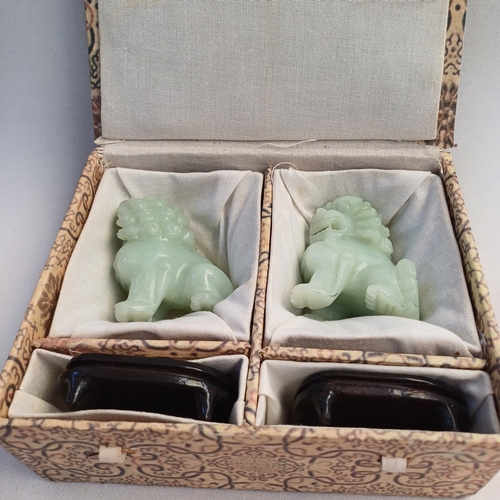 44 - Chinese Hand Carved Jade Lions with wooden stands which comes with their travel box which itself has... 