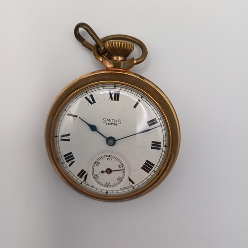 116 - Smiths Empire Pocket Watch in gold coloured casement.  Working