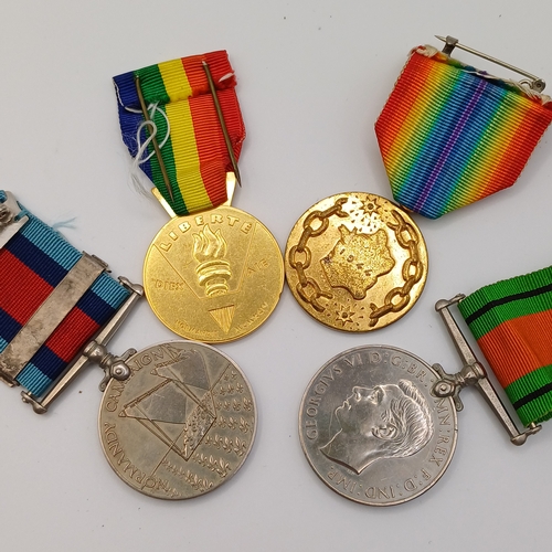 121 - Four Medals, thee are not engraved/awarded to a specific person:
1. George VI Defence Medal
2. Opera... 