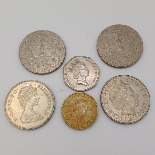 122 - Selection of Coins: 
4 x £5.00 (2 Silver Jubilee, Queen Mother, Charles/Diana)
- 1 x 50 pence
- 1 x ... 