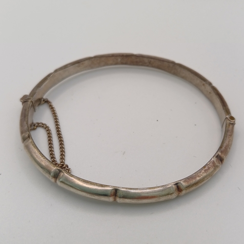 124 - Six Silver Bangles:
- 4 x hinged
- 1 slip on 
- 1 x expanding

All are marked either 925 or are hall... 