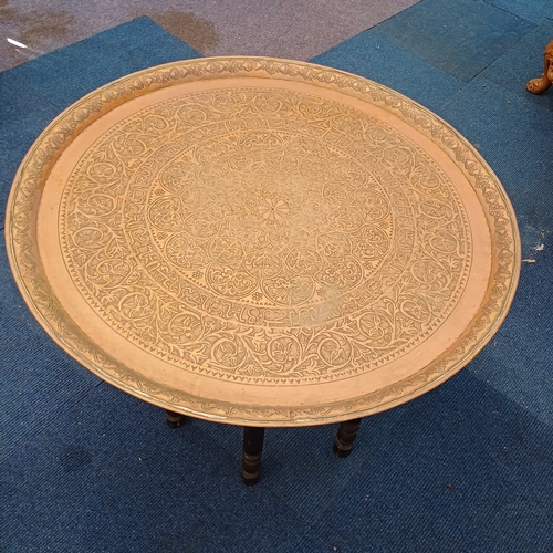 71 - An Arabic Coffee Table in very good condition