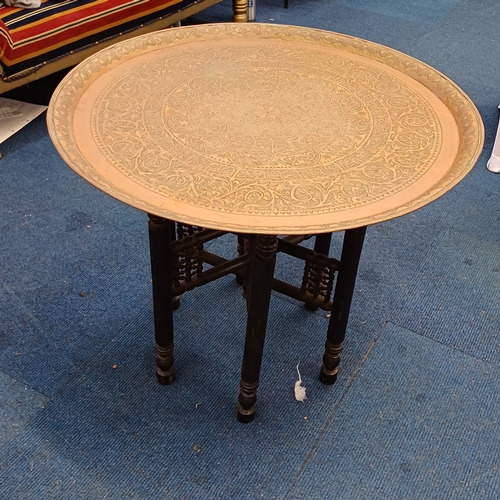 71 - An Arabic Coffee Table in very good condition