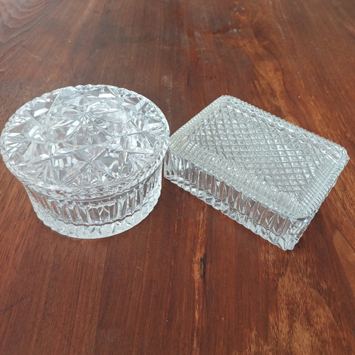 82 - Two really lovely cut glass trinket boxes.