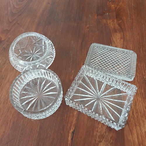 82 - Two really lovely cut glass trinket boxes.