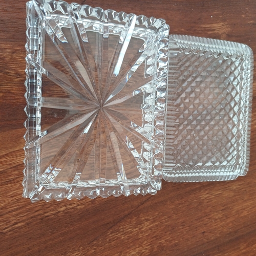 82 - Two really lovely cut glass trinket boxes.