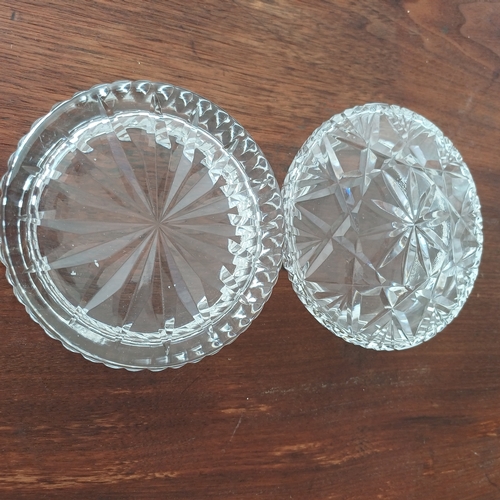 82 - Two really lovely cut glass trinket boxes.