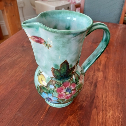 83 - A pretty pottery jug