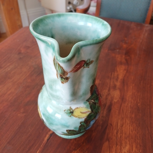 83 - A pretty pottery jug