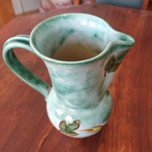 83 - A pretty pottery jug