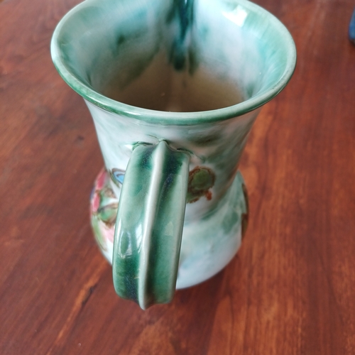 83 - A pretty pottery jug