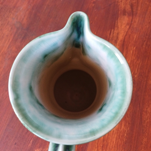 83 - A pretty pottery jug