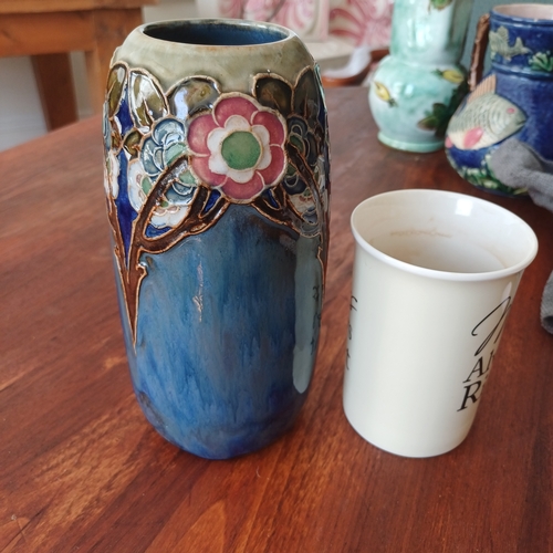 85 - Royal Doulton Vase in a very pretty blue with flower design