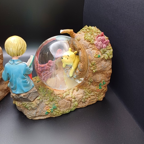 94 - Disney Winnie the Pooh and Christopher Robin Snow Globes as Book Ends.  These would compliment any c... 