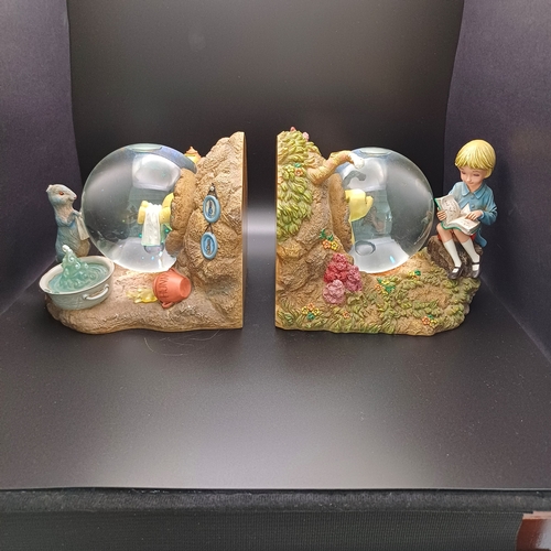 94 - Disney Winnie the Pooh and Christopher Robin Snow Globes as Book Ends.  These would compliment any c... 