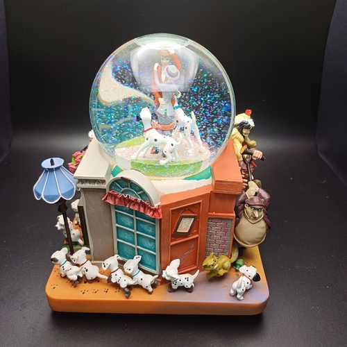 103 - Disney's 101 Dalmatians snow globe which is a music box as well playing 'Cruella de Ville' by Mel Le... 