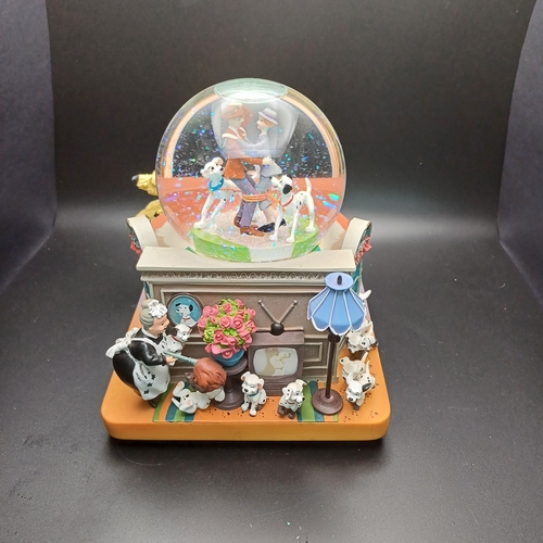 103 - Disney's 101 Dalmatians snow globe which is a music box as well playing 'Cruella de Ville' by Mel Le... 