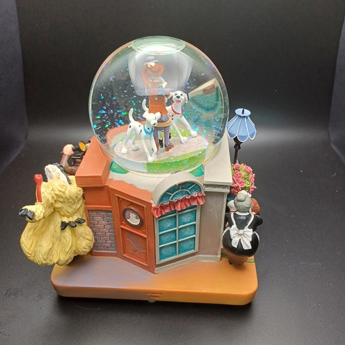 103 - Disney's 101 Dalmatians snow globe which is a music box as well playing 'Cruella de Ville' by Mel Le... 