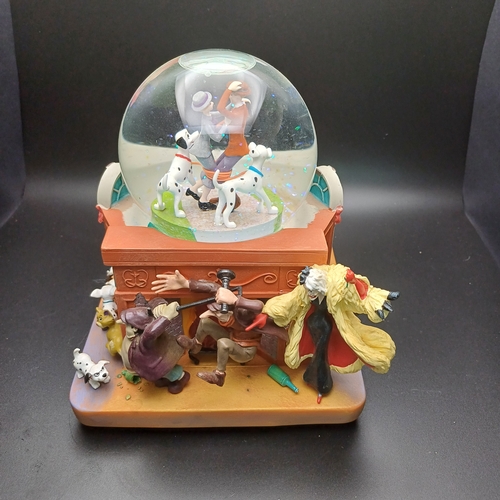 103 - Disney's 101 Dalmatians snow globe which is a music box as well playing 'Cruella de Ville' by Mel Le... 