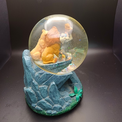 104 - Disney's 'Lion King' snow globe sitting on 'Pride Rock' which is also a music box playing 'Circle of... 