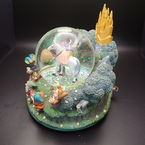 105 - Disney's 'Snow White and the Seven Dwarfs' Snow Globe with Snow White with Prince Charming and all t... 