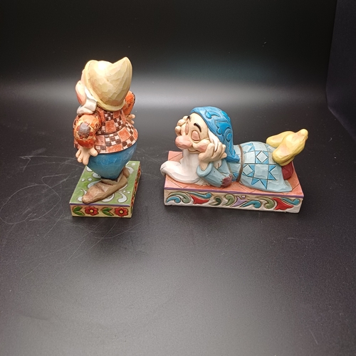 106 - Disney Traditions Showcase  Figures of two Snow White's Dwarfs:
'Zzzz' (Sleepy) Number A25830
''Happ... 