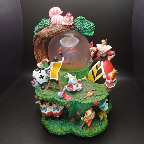 110 - Disney Alice in Wonderland Scene  Snow Globe with the Queen of Hearts and Cheshire Cat.  This is a m... 