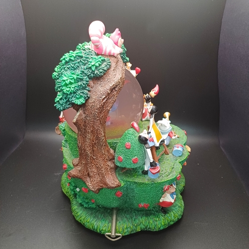 110 - Disney Alice in Wonderland Scene  Snow Globe with the Queen of Hearts and Cheshire Cat.  This is a m... 