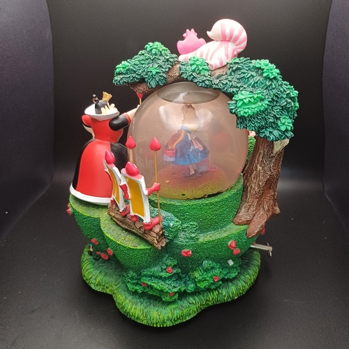 110 - Disney Alice in Wonderland Scene  Snow Globe with the Queen of Hearts and Cheshire Cat.  This is a m... 