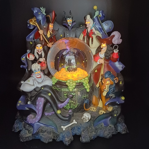 112 - Disney Villains Musical Snow Globe playing 'Grim Grinning Ghosts'.  This consists of Maleficent, Cru... 