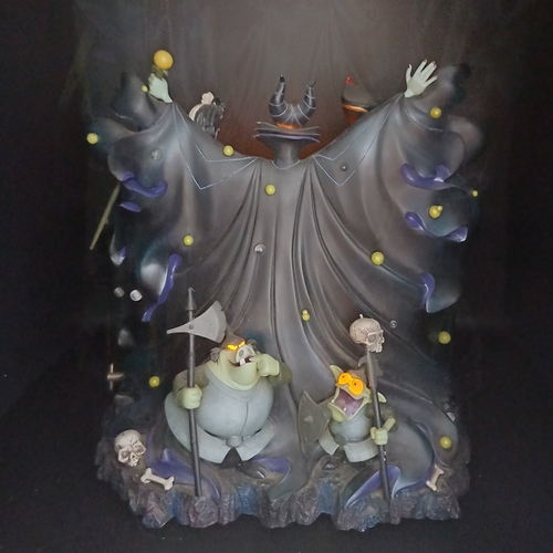 112 - Disney Villains Musical Snow Globe playing 'Grim Grinning Ghosts'.  This consists of Maleficent, Cru... 