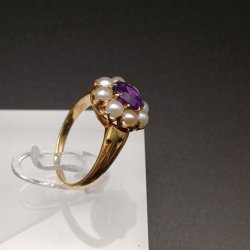 3 - A beautiful Ladies Victorian Amethyst and Pearl Cluster Ring.
- 2.5 g
- size M
- 15 ct yellow gold