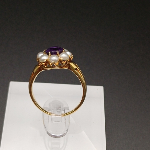 3 - A beautiful Ladies Victorian Amethyst and Pearl Cluster Ring.
- 2.5 g
- size M
- 15 ct yellow gold