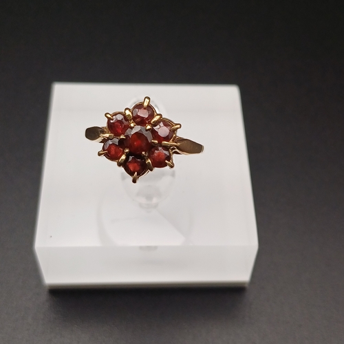 4 - Ladies 1950's Garnet Cluster Ring
- size L
- 2.5 g
- 9 ct