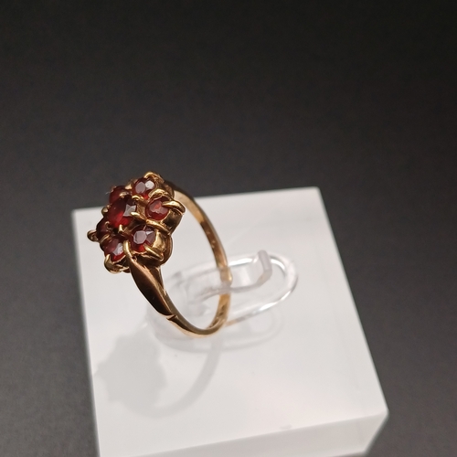 4 - Ladies 1950's Garnet Cluster Ring
- size L
- 2.5 g
- 9 ct