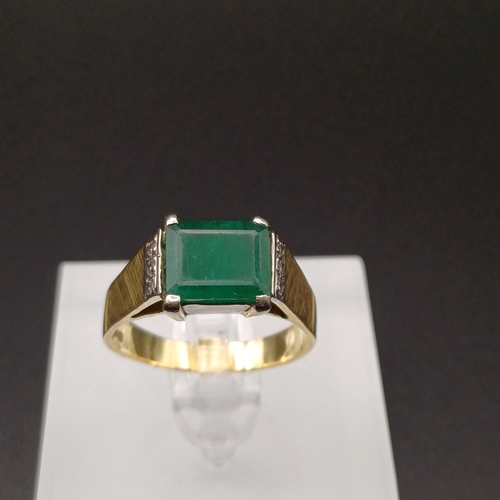 8 - This is the most beautiful Unpolished Emerald Ring with Three Diamonds set either side.
- size Q
- 6... 