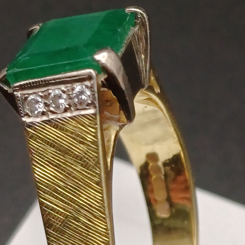 8 - This is the most beautiful Unpolished Emerald Ring with Three Diamonds set either side.
- size Q
- 6... 