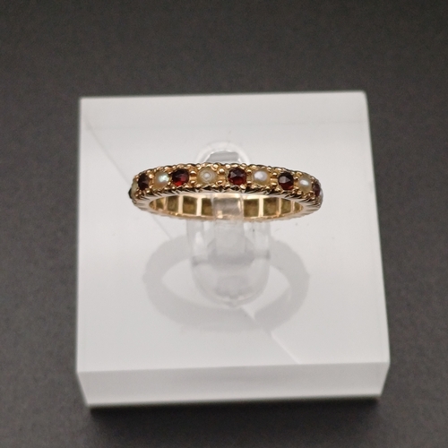 10 - Full Eternity Ring set with Garnet and Sea Pearls
- 9 ct yellow gold
- size M
- 2.7 g