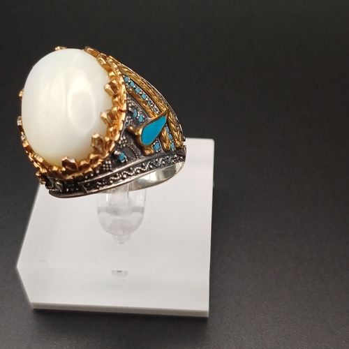 14 - Graduation Style Ottoman Gent's Ring set with Pearl and Turquoise.  Stunning.
- 925 silver
- size Z ... 