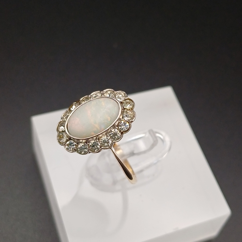 28 - Very Pretty Opal and White Stone Ring.  The Opal has lots of colour as you can see from the photos.
... 