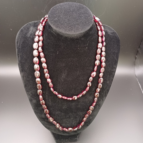 30 - This is a stunning Garnet Strung Necklace which measures 32 inches.  The Vendor had this re-strung a... 