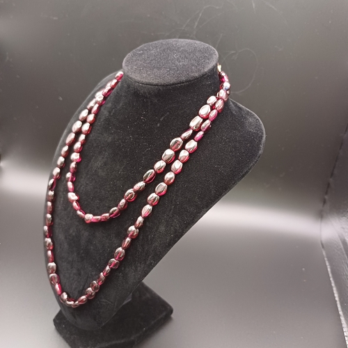 30 - This is a stunning Garnet Strung Necklace which measures 32 inches.  The Vendor had this re-strung a... 