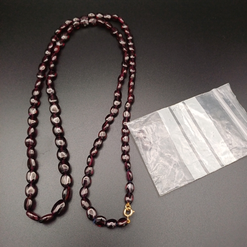 30 - This is a stunning Garnet Strung Necklace which measures 32 inches.  The Vendor had this re-strung a... 