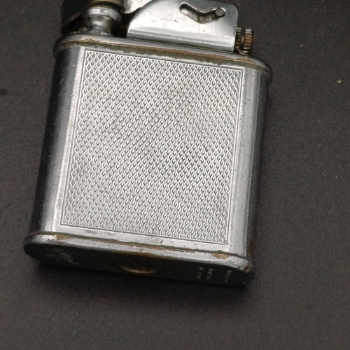 37 - A 1920's Cigarette Lighter weighing 40.3 g and you can see the marking of a Polo Player