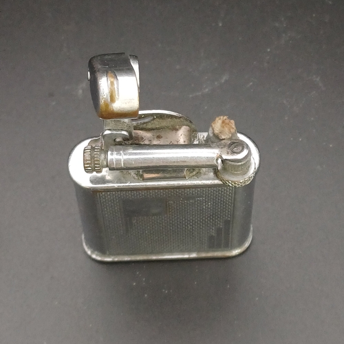 37 - A 1920's Cigarette Lighter weighing 40.3 g and you can see the marking of a Polo Player