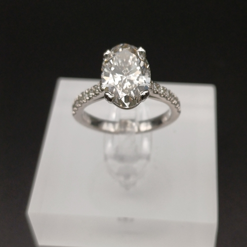 47 - Now we have a stunning Oval Shaped Solitaire Diamond Ring with Diamonds inset in the shank.
- Platin... 