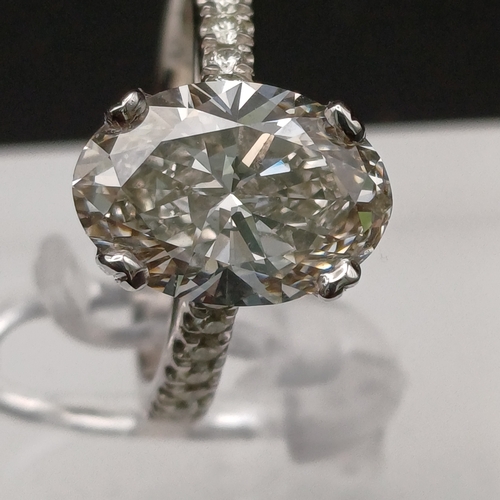 47 - Now we have a stunning Oval Shaped Solitaire Diamond Ring with Diamonds inset in the shank.
- Platin... 