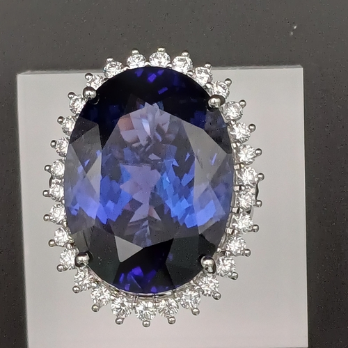 48 - Look at the deep colour of this Tanzanite!  It is no less than 30 ct and then you have beautiful Dia... 